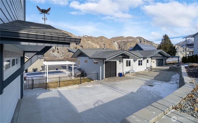 exterior space featuring a mountain view