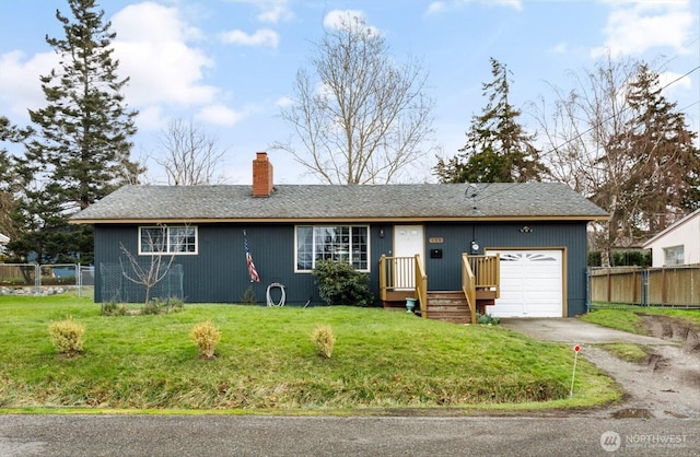 ranch-style house featuring an attached garage, fence, driveway, a chimney, and a front yard