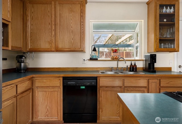 kitchen with black dishwasher, glass insert cabinets, and a sink