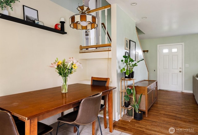 dining space featuring wood finished floors