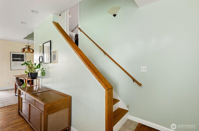 stairway with baseboards