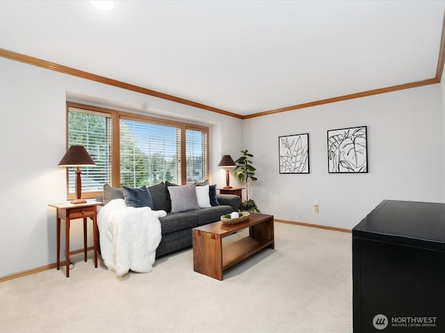 living room featuring baseboards, ornamental molding, and light colored carpet