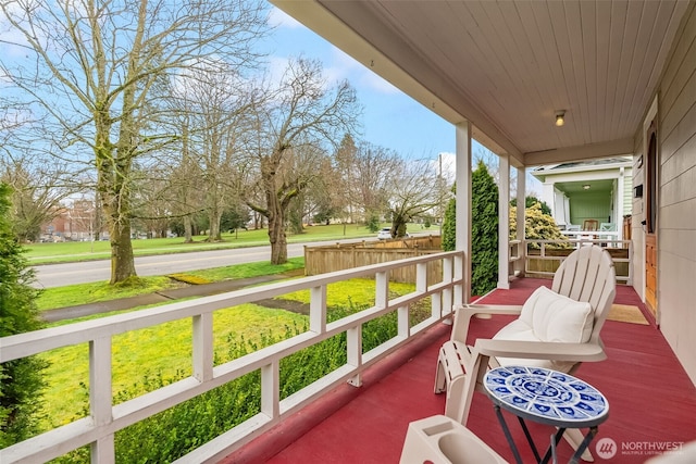 balcony featuring covered porch