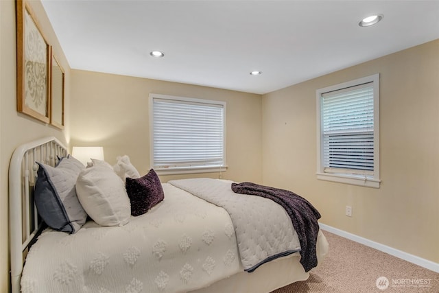 bedroom with recessed lighting, carpet flooring, and baseboards