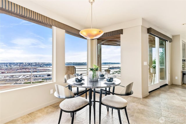 dining room with baseboards