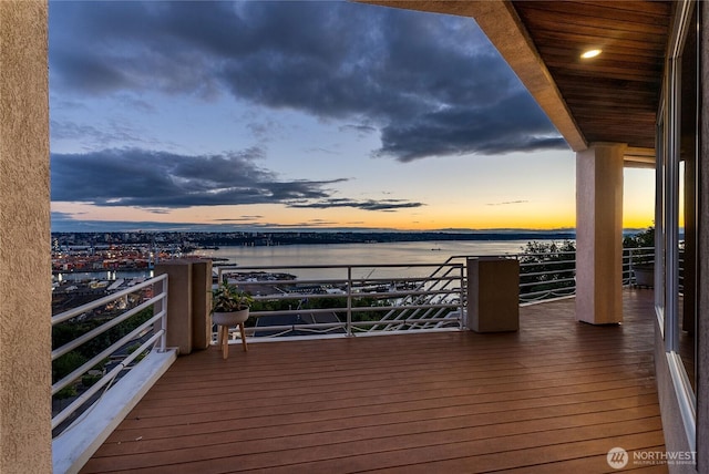 deck at dusk with a water view