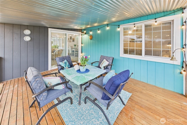 deck with outdoor dining space