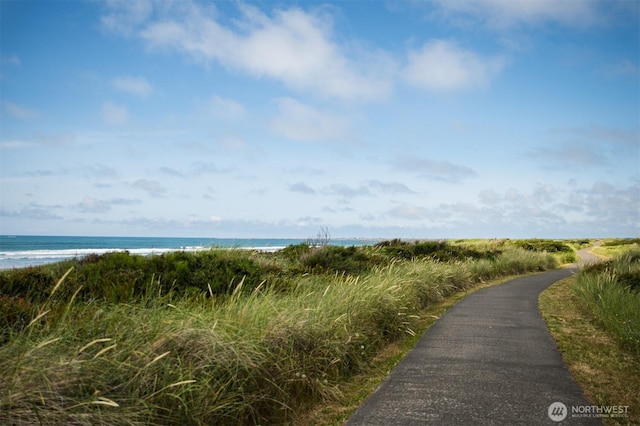 exterior space featuring a beach view