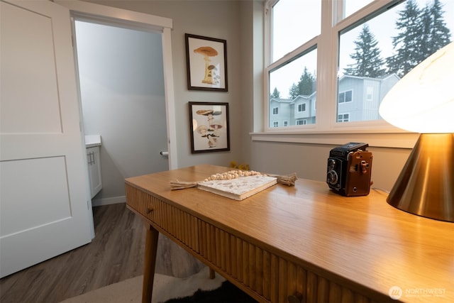 home office with dark wood finished floors