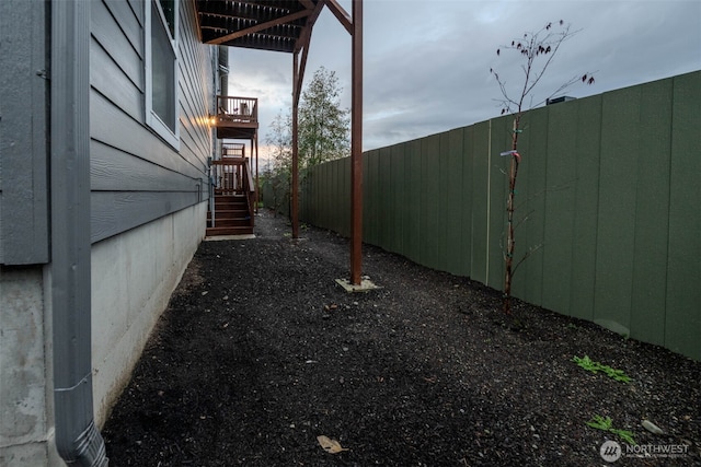 view of yard featuring fence