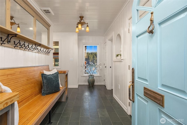 mudroom featuring visible vents, a notable chandelier, and baseboards