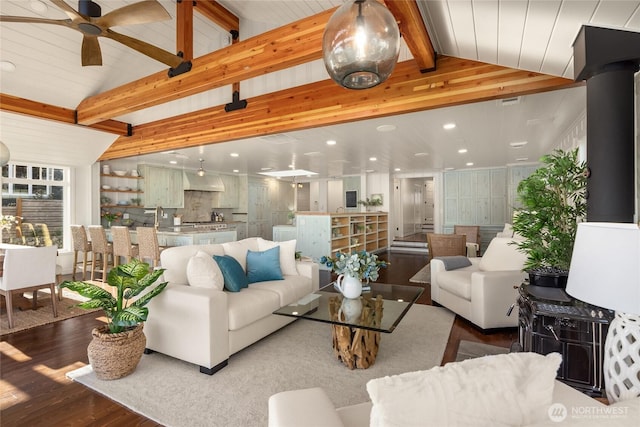 living room with lofted ceiling with beams, ceiling fan, wood finished floors, and recessed lighting