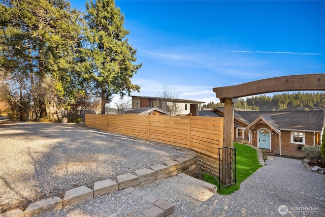 exterior space featuring a fenced front yard