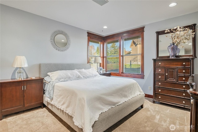 bedroom featuring recessed lighting, baseboards, and light colored carpet