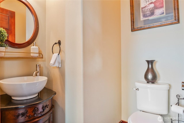 bathroom featuring a sink and toilet