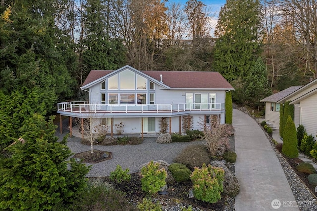 view of front of house featuring a deck