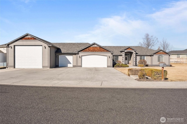 view of front of house featuring a garage and driveway