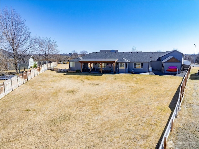 view of front of property featuring fence private yard and a front yard