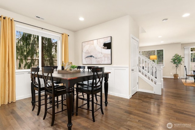 dining area with visible vents, stairway, a wainscoted wall, recessed lighting, and dark wood-style floors