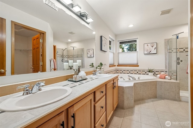 22426 SE 300th St, Black Diamond, WA 98010 - full bath with a bath, visible vents, tile patterned floors, a sink, and a stall shower