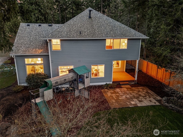 22426 SE 300th St, Black Diamond, WA 98010 - back of house featuring fence, a patio area, and roof with shingles