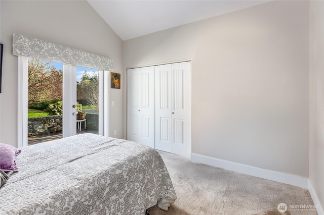 bedroom featuring carpet floors, access to outside, vaulted ceiling, and baseboards