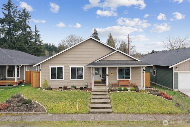 view of front of property with a porch, a front yard, and fence