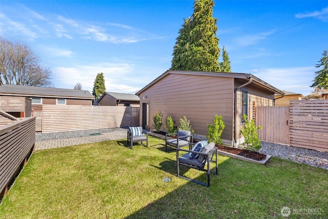 view of yard featuring a fenced backyard