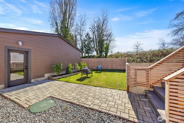 view of yard with a patio and fence