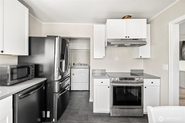 kitchen featuring washer / dryer, under cabinet range hood, white cabinets, and appliances with stainless steel finishes