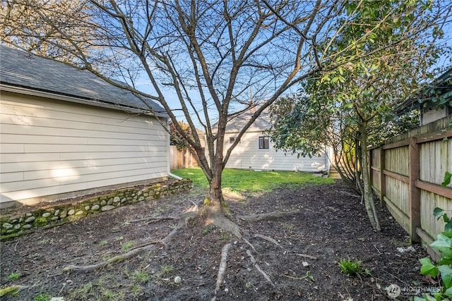 view of yard featuring a fenced backyard