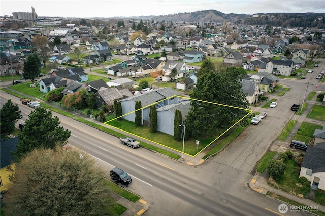 aerial view featuring a residential view and a mountain view