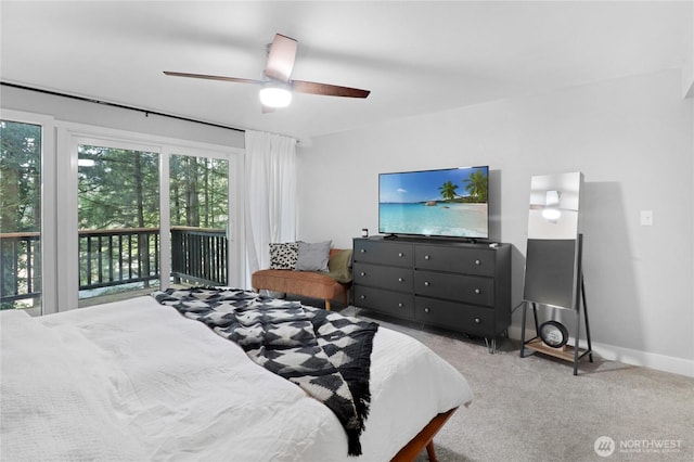 carpeted bedroom featuring a ceiling fan, access to outside, and baseboards