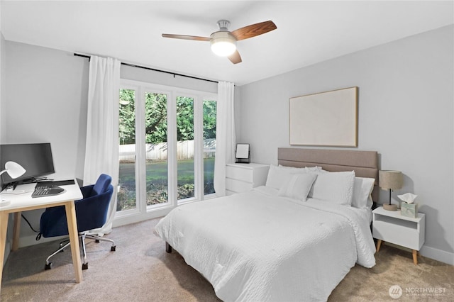 bedroom with carpet flooring, a ceiling fan, and baseboards