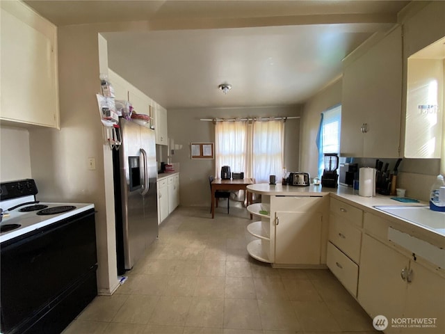 kitchen with electric stove, open shelves, light countertops, a peninsula, and stainless steel fridge with ice dispenser