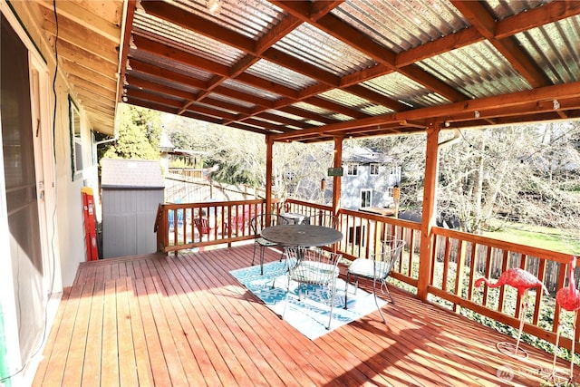 wooden deck with outdoor dining area