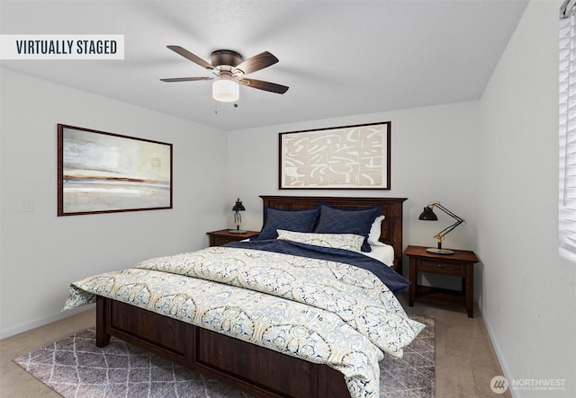 bedroom with carpet, baseboards, and ceiling fan