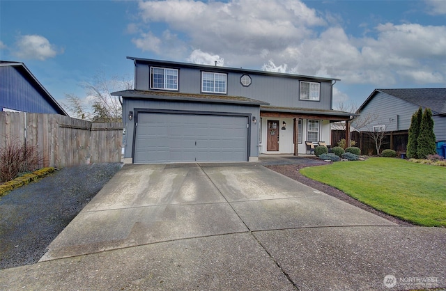 traditional-style house with fence, concrete driveway, a front yard, covered porch, and a garage