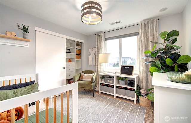 bedroom featuring visible vents