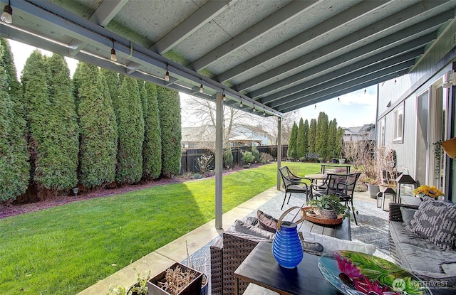 view of patio / terrace featuring a fenced backyard and an outdoor hangout area