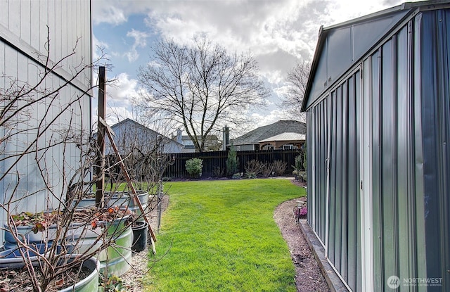 view of yard featuring a fenced backyard