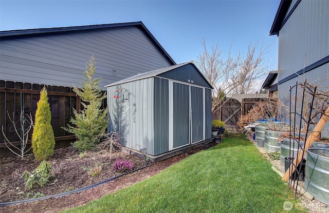 view of shed featuring a fenced backyard