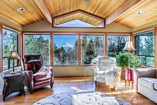 sunroom / solarium with wood ceiling and vaulted ceiling with beams