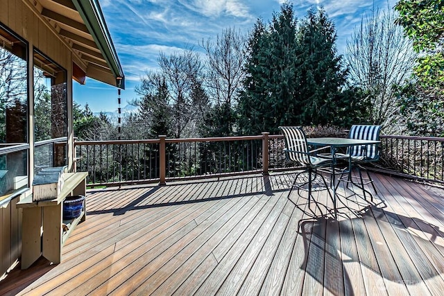 deck featuring outdoor dining space