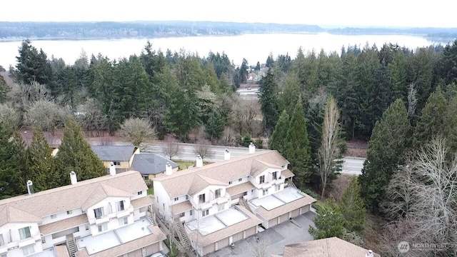 aerial view featuring a view of trees