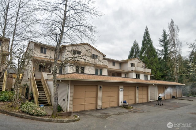 view of front of house with stairway