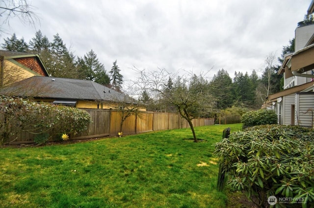 view of yard with fence