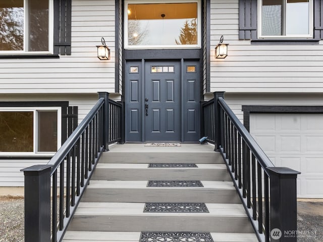 entrance to property with an attached garage