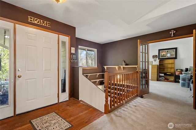 foyer entrance featuring wood finished floors