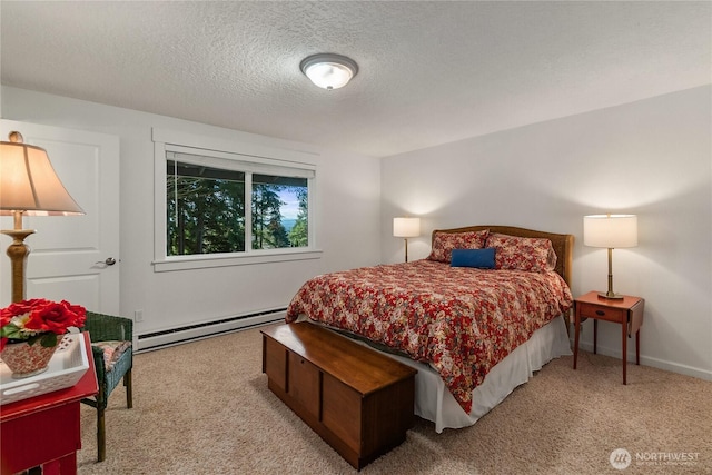 bedroom with a baseboard radiator, baseboards, a textured ceiling, and carpet flooring